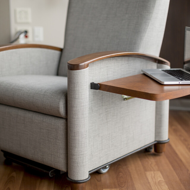 Cove recliner flip table in patient room